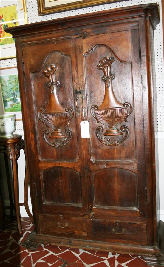 Appraisal: Continental carved walnut cabinet late th century molded crown over