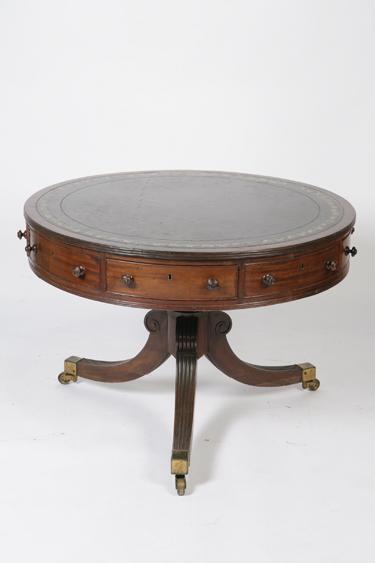 Appraisal: A REGENCY STYLE MAHOGANY DRUM-TOP LIBRARY TABLE the circular top