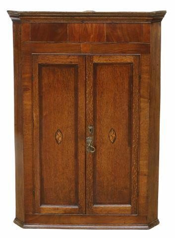 Appraisal: English Georgian period oak and mahogany hanging corner cupboard late