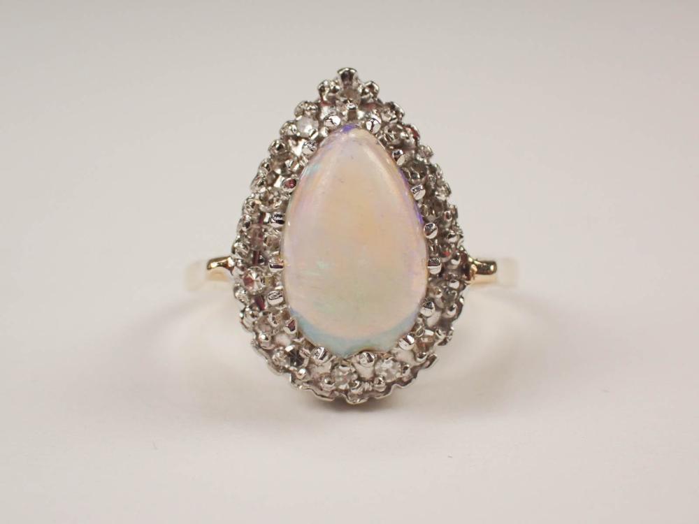 Appraisal: OPAL DIAMOND AND FOURTEEN KARAT GOLD RING The k white