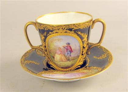 Appraisal: Sevres style cobalt trembleuse cup saucer early th century The