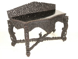 Appraisal: An Anglo-Indian carved hardwood console table circa the pierced leaf