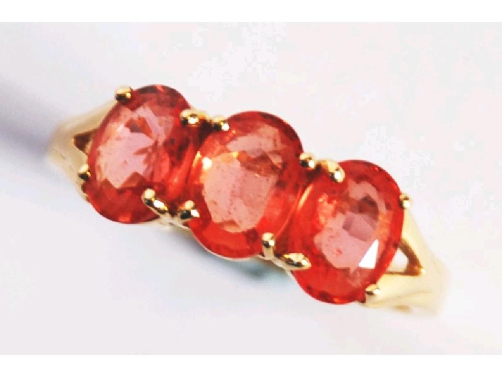 Appraisal: ct GOLD RING set with three oval Ceylon Padraradscha pink