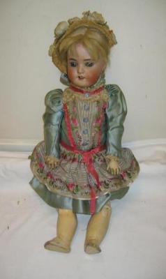 Appraisal: A Simon and Halbig bisque head doll with blue sleeping