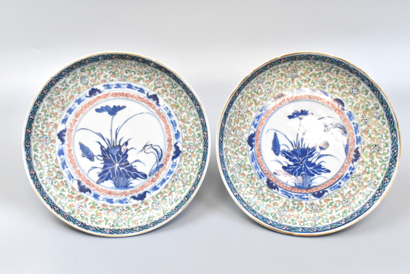 Appraisal: A pair of Chinese blue and famille rose plates dated