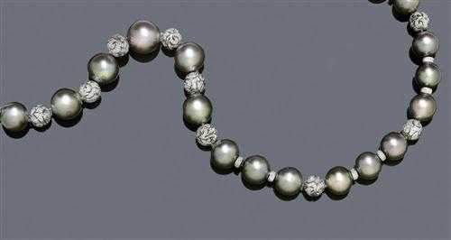 Appraisal: TAHITI PEARL AND BRILLIANT-CUT DIAMOND SAUTOIR White gold Fancy necklace