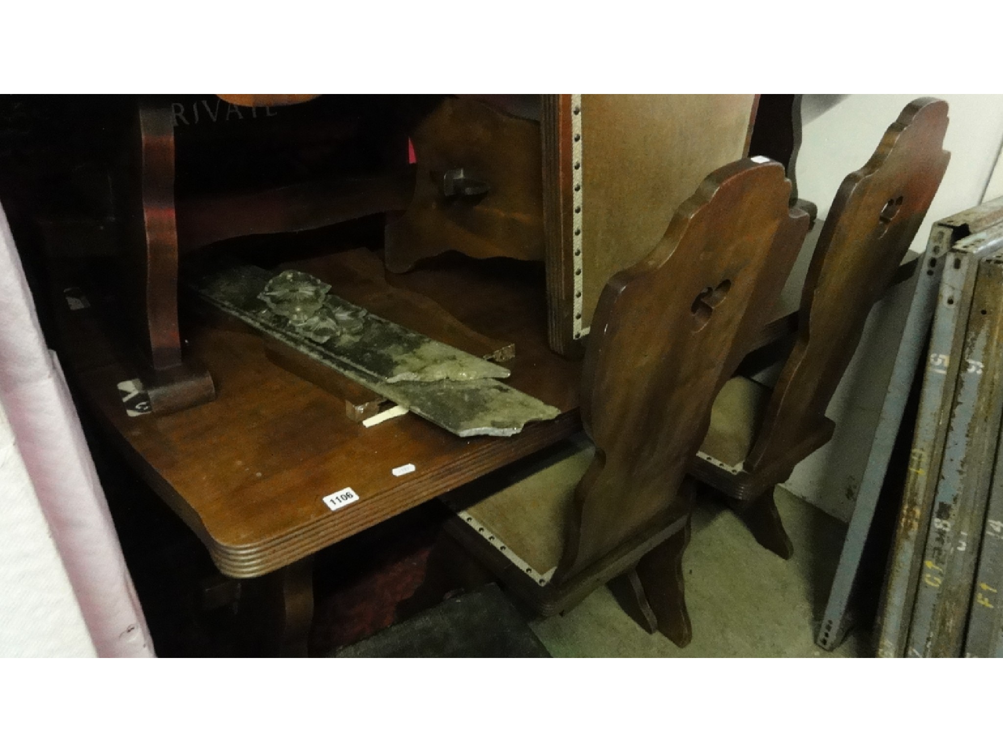 Appraisal: A dining room suite comprising refectory type table with shaped