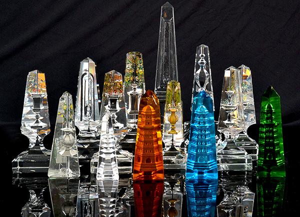 Appraisal: A COLLECTION OF FOURTEEN COLOURED AND CLEAR GLASS OBELISKS seven