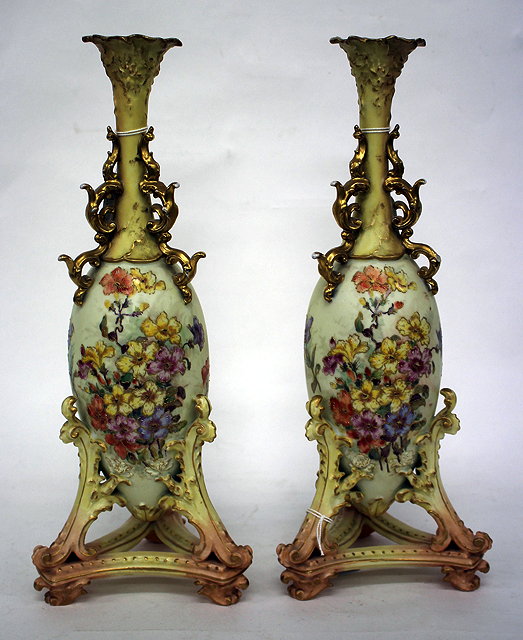 Appraisal: A PAIR OF ANTIQUE GERMAN RUDOLSTADT VOLKSTEDT IVORY PORCELAIN VASES