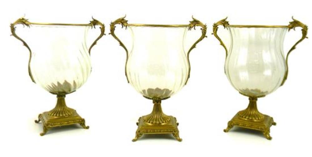 Appraisal: GLASS Three matching glass and brass urns bulbous bodies with