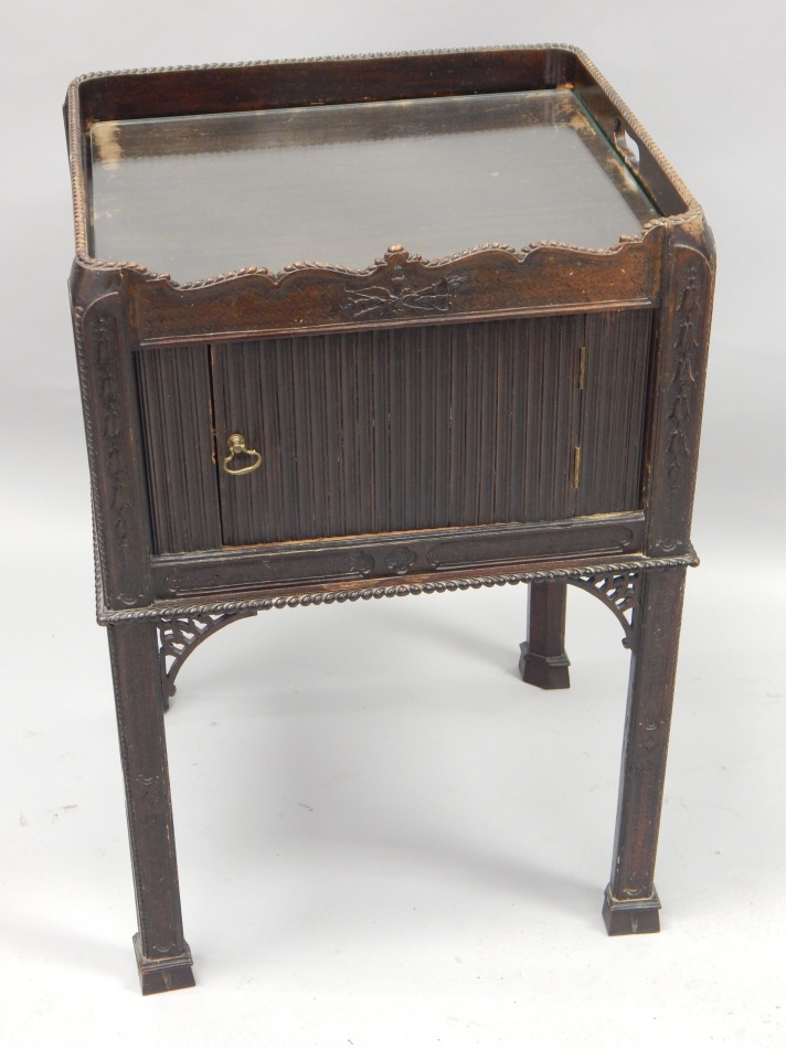 Appraisal: A George III mahogany pot cupboard with a raised top