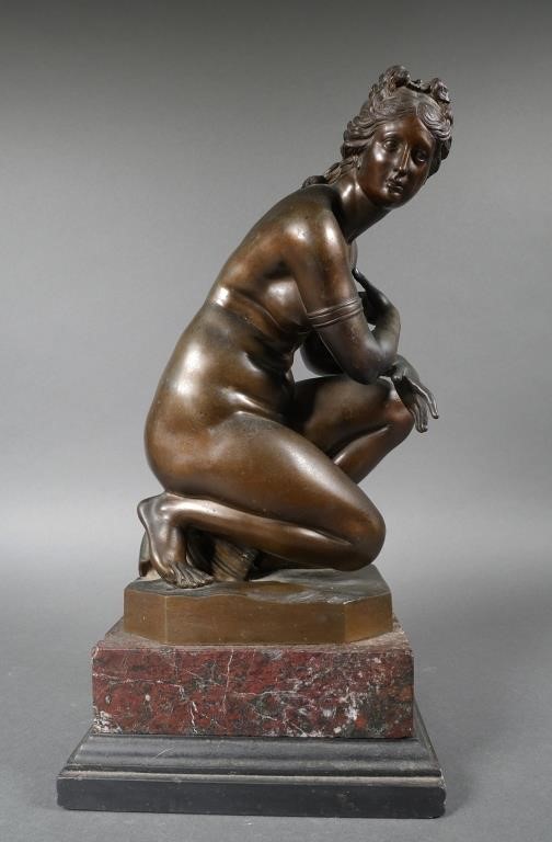 Appraisal: BRONZE NUDE ON SEASHELL SCULPTUREBronze nude woman sitting on a