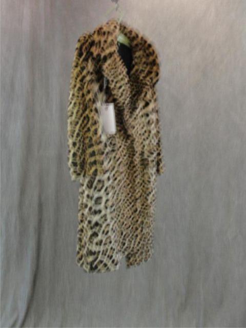 Appraisal: Vintage Leopard Skin Coat with Black Lining From a Pleasantville