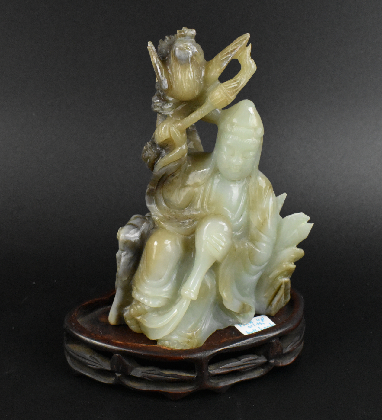 Appraisal: A Chinese jade carving of a guanyin figure dating from