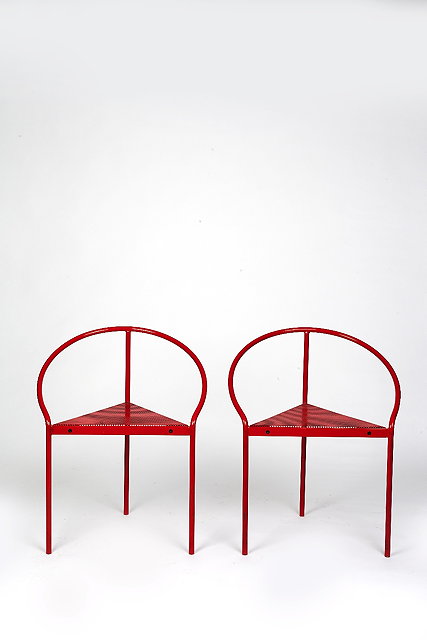 Appraisal: Italian SchoolPair of modernist chairsin red metal with triangular meshed