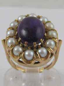 Appraisal: A hallmarked carat gold cabochon amethyst and cultured pearl ring