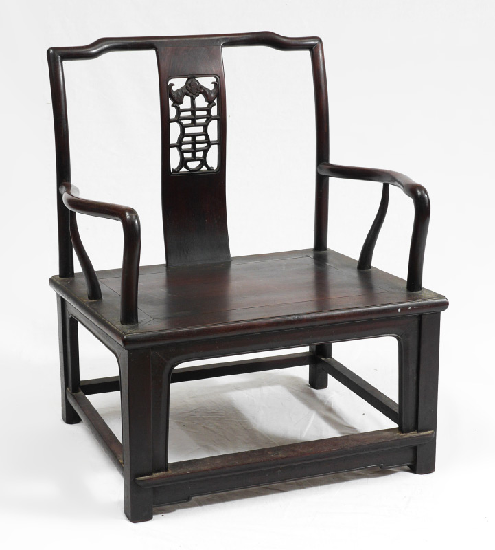 Appraisal: CHINESE CARVED ROSEWOOD ARMCHAIR Heavy wide rosewood frame with carved