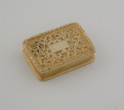 Appraisal: A Victorian silvergilt vinaigrette with embossed scrolling and engine turning