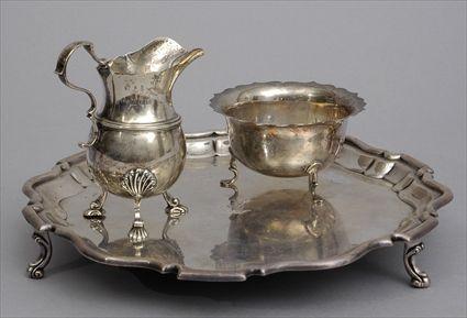 Appraisal: ENGLISH SILVER TRIPOD SALVER AND ASSEMBLED CREAMER AND SUGAR BOWL