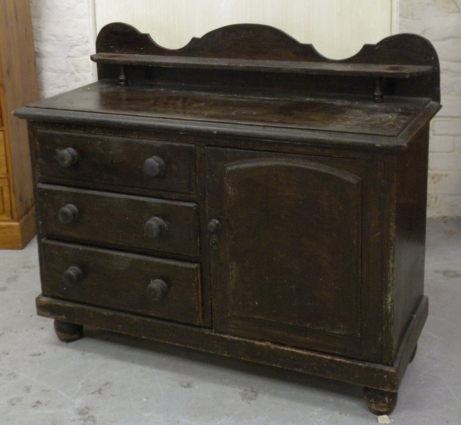 Appraisal: A thC painted pine Lincolnshire dresser with a carved scroll