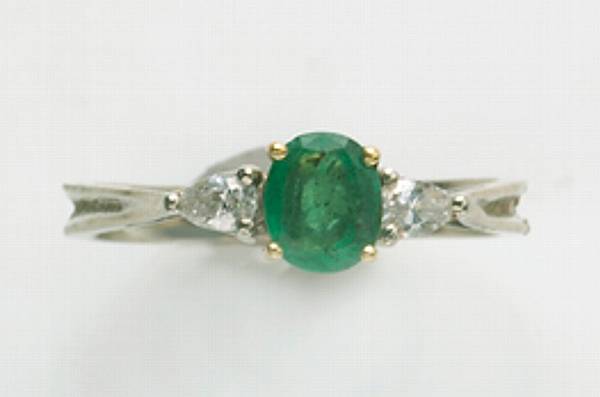 Appraisal: An emerald diamond and k white gold ring