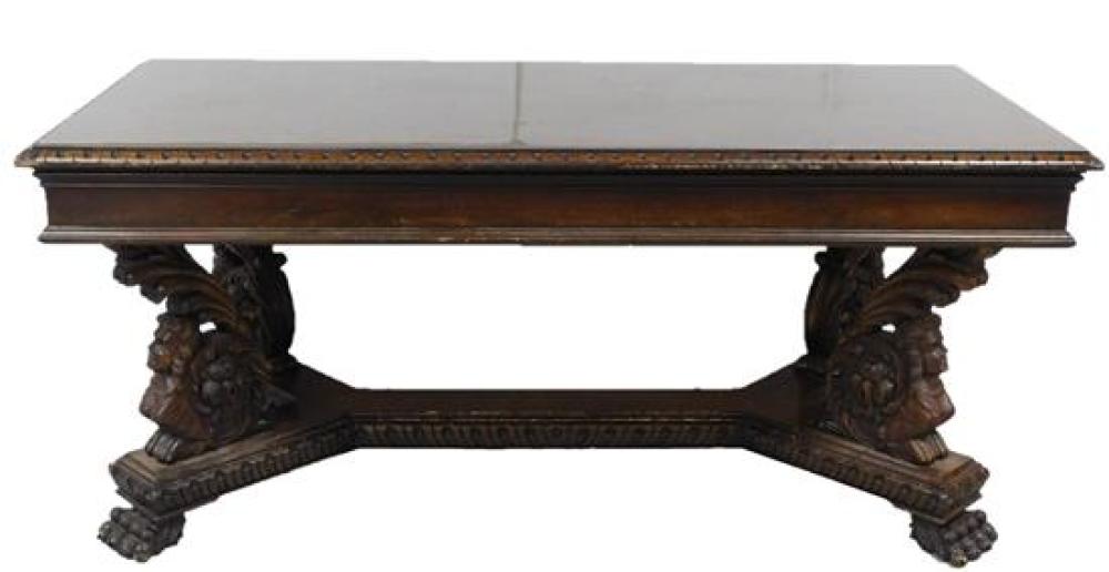 Appraisal: Library table oblong top with figural scroll and paw carved