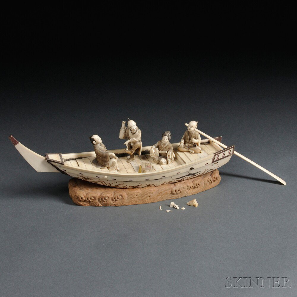 Appraisal: Ivory Boat with Four Figures Japan th th century a