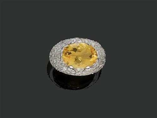 Appraisal: CITRIN-BRILLANT-RING Weissgold Dekorativer eleganter Ring die breite leicht bombierte Schauseite