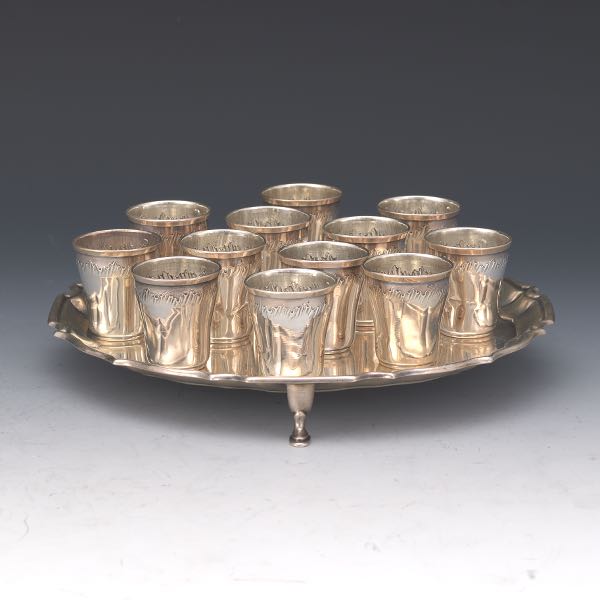 Appraisal: STERLING SALVER AND SHOT GLASSES Sterling silver salver London dated