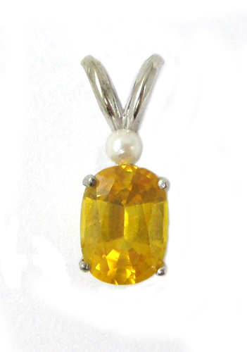 Appraisal: GOLDEN BERYL SEED PEARL AND WHITE GOLD PENDANT The k