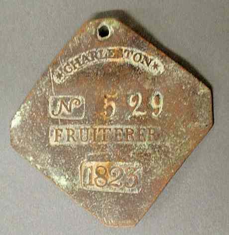 Appraisal: Rare copper slave tag Charleston N Fruiterer diamond shaped x