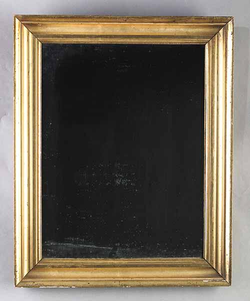 Appraisal: A Small Antique Giltwood Mirror the rectangular cove molded frame