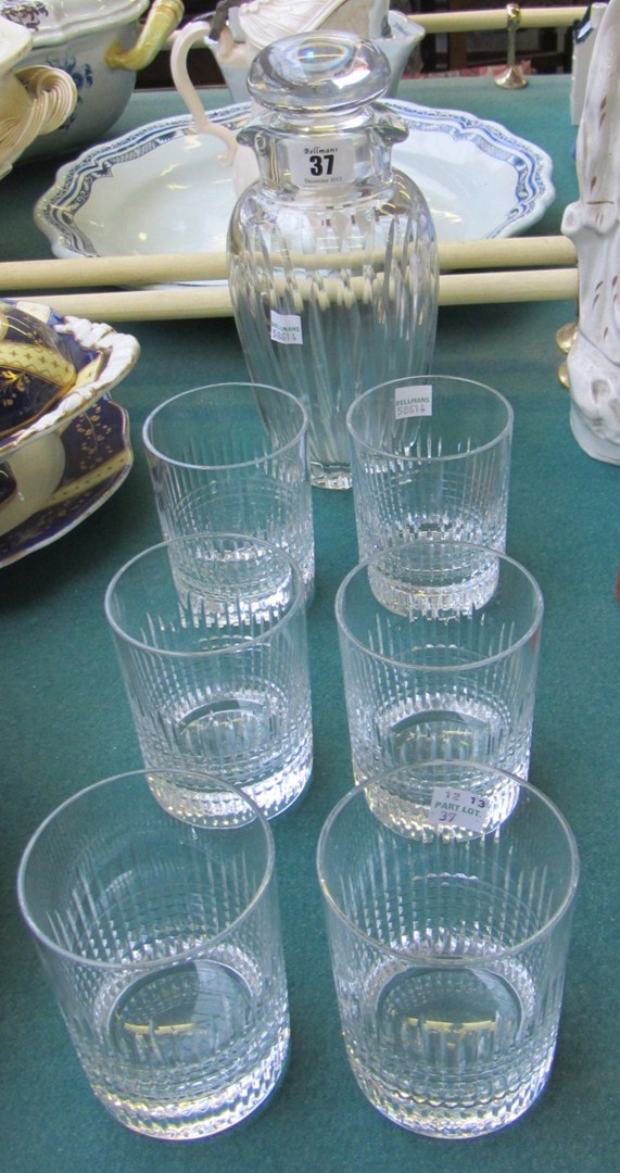 Appraisal: A set of Baccarat glass tumblers and a double lipped