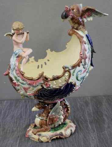 Appraisal: Majolica Ewer with Parrot and Putti Imagery From a Long