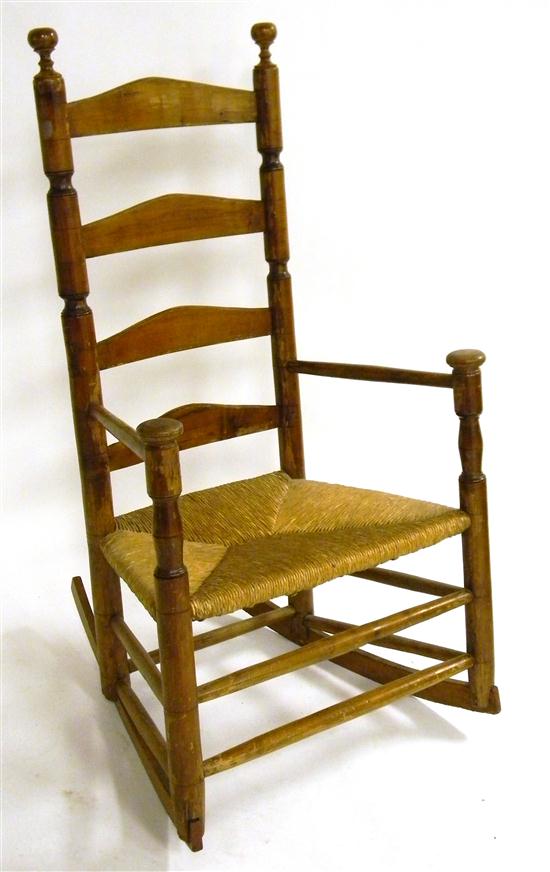 Appraisal: Ladder back armchair four arched splats mushroom capped hand rests