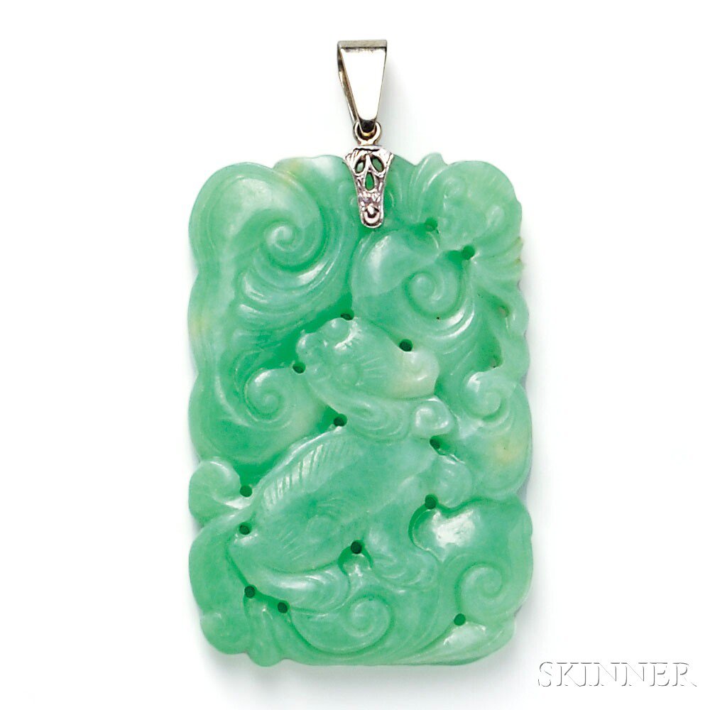 Appraisal: Jade Pendant depicting a foo dog amongst scrolling foliate devices