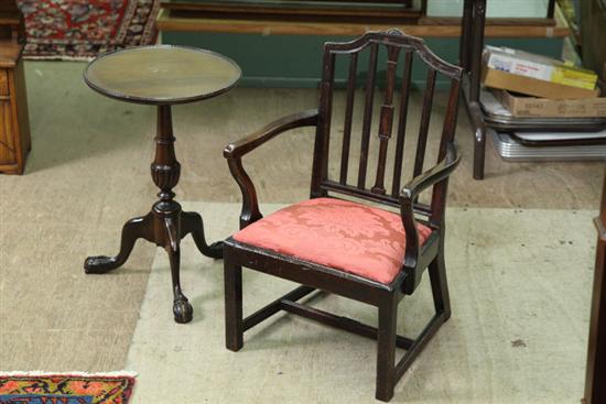 Appraisal: TWO PIECES OF CHILDRENS FURNITURE A banister back armchair with