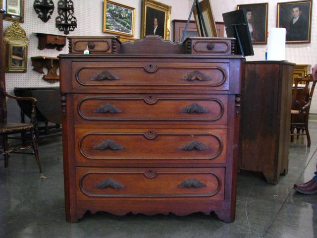 Appraisal: Late Victorian Mahogany Dresser with leaf and nut pulls four