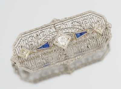 Appraisal: An Art Deco Diamond and Sapphire Filigree Brooch k white