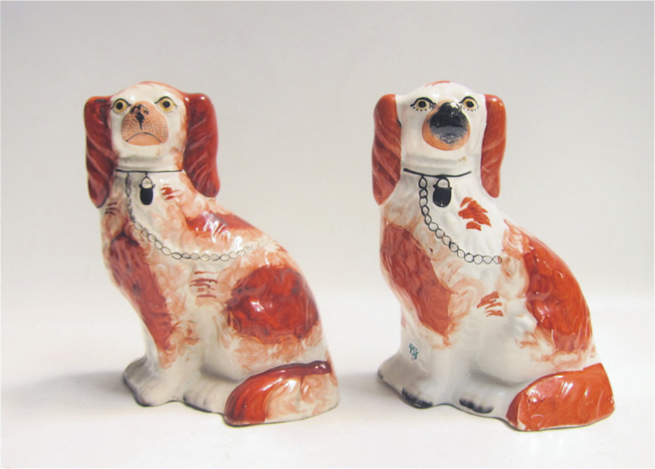 Appraisal: PAIR ENGLISH STAFFORDSHIRE PORCELAIN DOGS in identical positions Heights inches