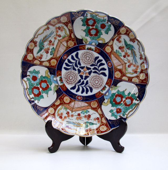 Appraisal: JAPANESE IMARI PORCELAIN CHARGER hand painted with fan-shaped reserves of