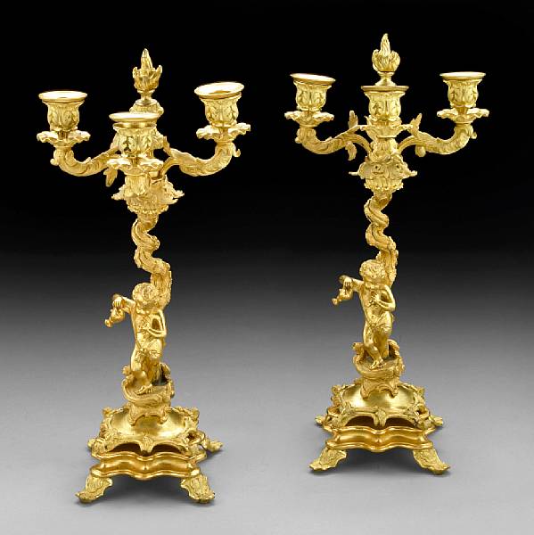 Appraisal: A pair of Napoleon III gilt bronze three light candelabra