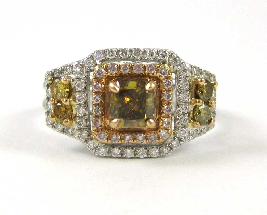 Appraisal: FANCY COLORED DIAMOND AND EIGHTEEN KARAT GOLD RING The white