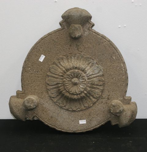 Appraisal: A stone Chapati plate on three self carved legs carved