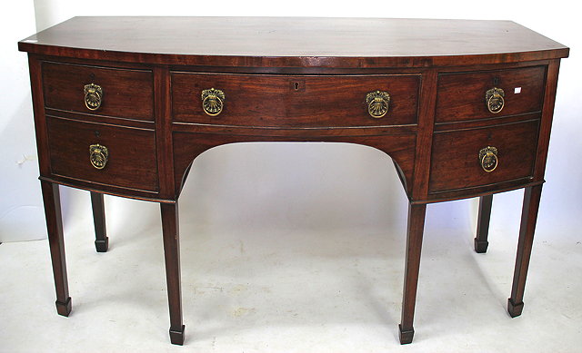 Appraisal: A GEORGIAN MAHOGANY BOW FRONTED SIDEBOARD with single drawer over