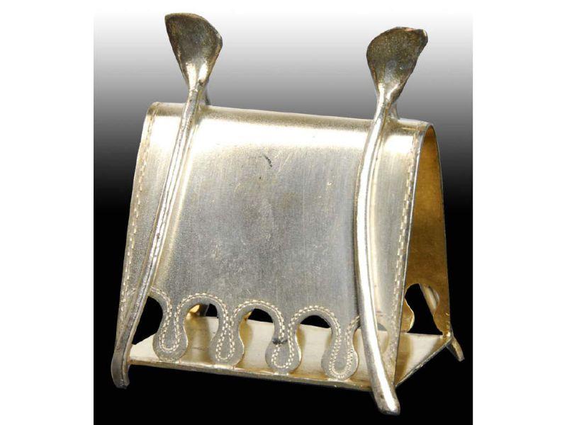 Appraisal: Triangular Wishbone Figural Napkin Ring Description Marked Wilcox Silver Plate