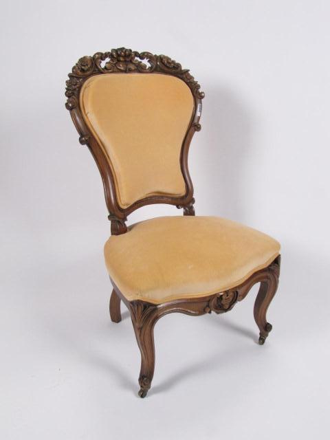 Appraisal: Late Victorian Slipper Chair floral and leave carved back peach