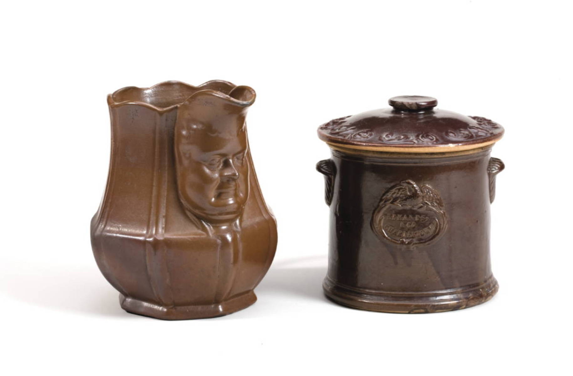 Appraisal: BROWN-GLAZED EARTHENWARE PITCHER AND A JAR AND COVER NINETEENTH CENTURY