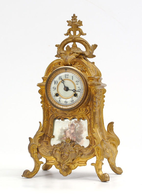 Appraisal: WATERBURY GILT BRONZE AND PORCELAIN MANTLE CLOCK Rococo revival style