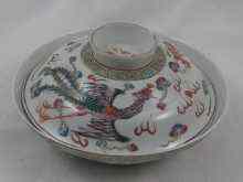 Appraisal: A Chinese bowl and cover decorated with dragons Approx cm